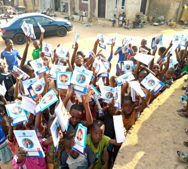 CIA FOUNDATION- PRIMARY SCHOOL PUPILS EDUCATIONAL SUPPORT PROGRAM- Distribution of books at Ezi-Agabi Village